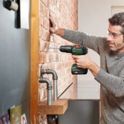 Bosch 18V Klopboormachine UniversalImpact (Incl. 2 Accu's 1.5Ah + Lader) -Elektrisch Gereedschap 123 3031